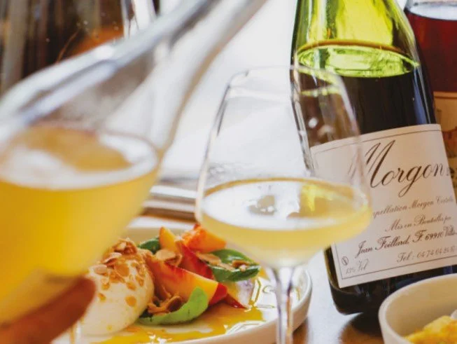 Glasses of wine and small plates at Little Cellars